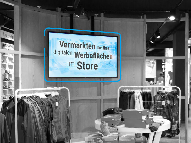 Bildschirm auf der Verkaufsfläche mit dem Slogan: Vermarkten Sie Ihre digitalen Werbeflächen im Store